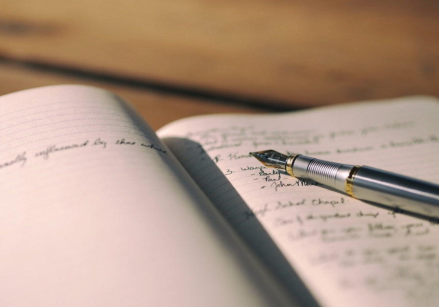 Pluma y libreta